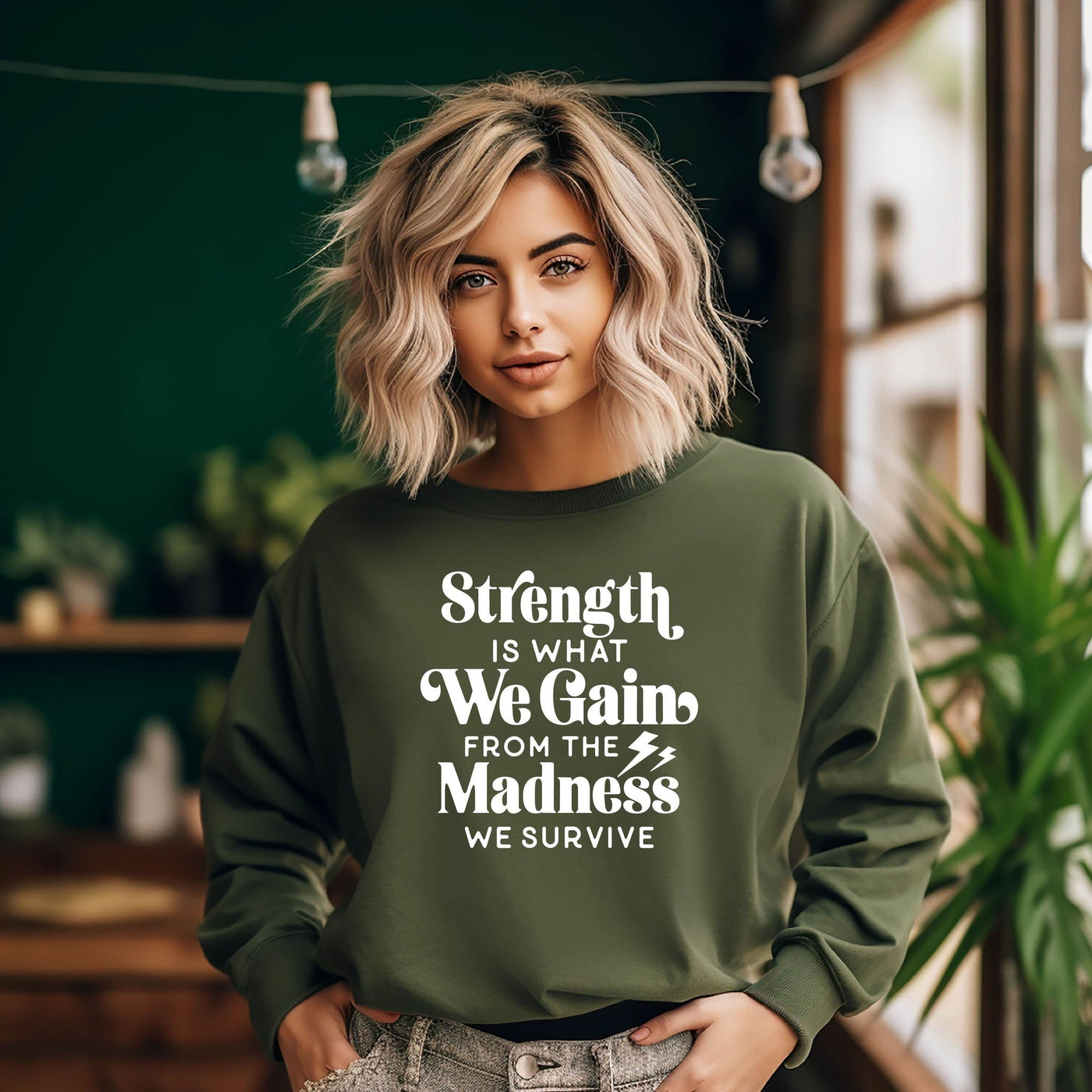 Strength Is What We Gain   Sweatshirt