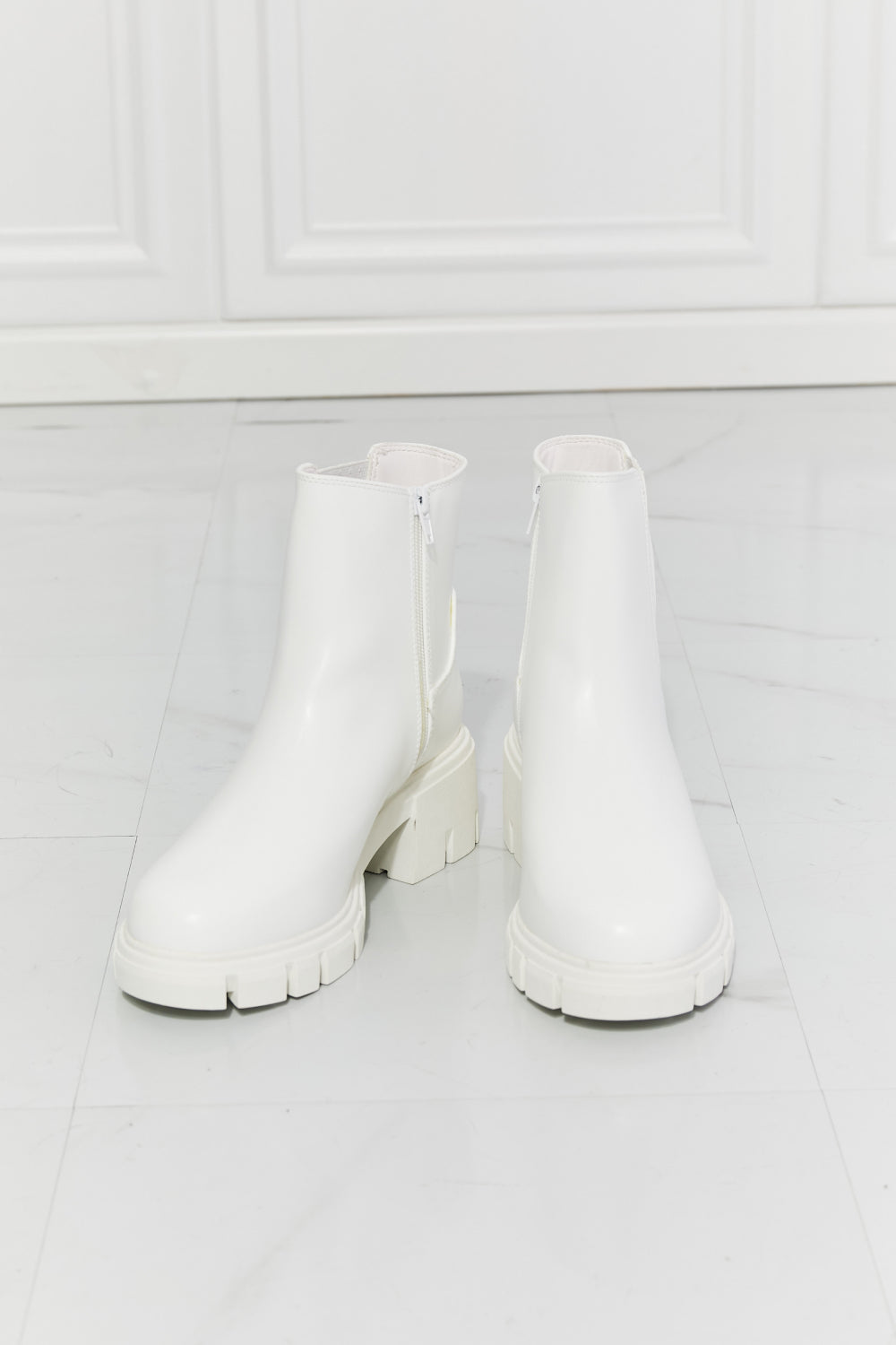 What It Takes Lug Sole Chelsea Boots in White - Copper + Rose